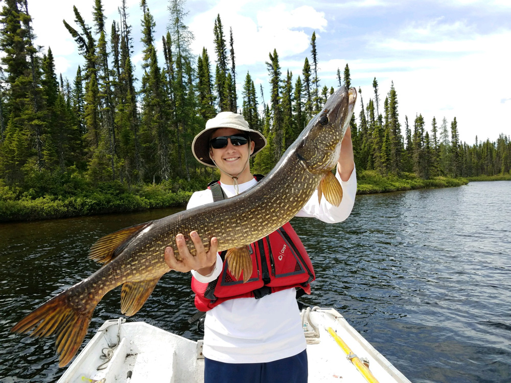Cory with a nice pike at lake Impossible